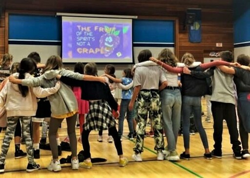 EIPS students in the Logos Christian program participate in a devotional activity at Brentwood Elementary.