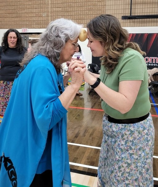 Elder Evelyn Day and Morgana Larsen, a First Nations, Métis and Inuit lead teacher at A.L. Horton Elementary, perform the apple dance together at the second EIPS Round Dance that took place at F.R. Haythorne Junior High.