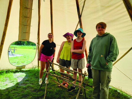 EIPS Summer School students in the traditional land-based learning course at Next Step take part in many activities, including assembling tipis, preparing hides and gathering food.