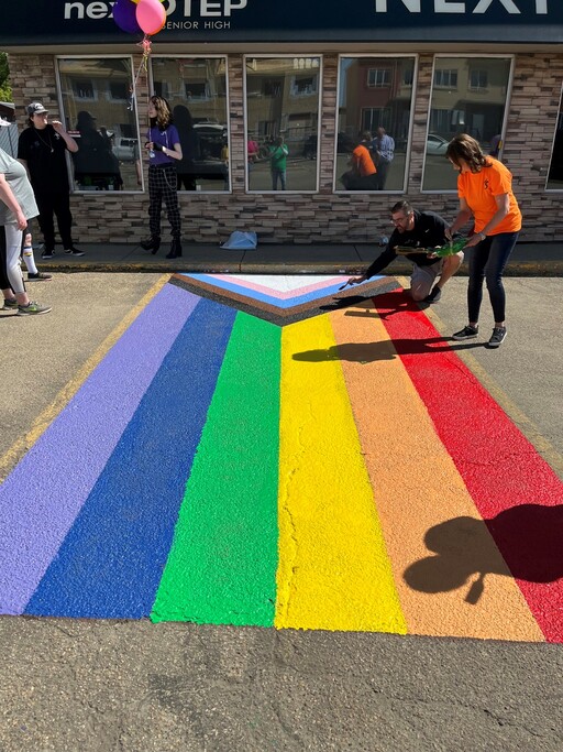Pride parking lot flag at Fort Saskatchewan Next Step
