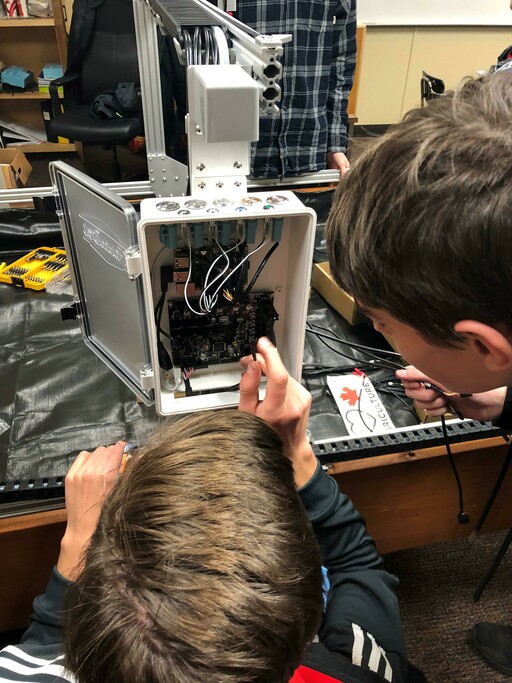 SCA Secondary students work on a robotic arm for their sustainable energy project Farmbot for the Hungry.