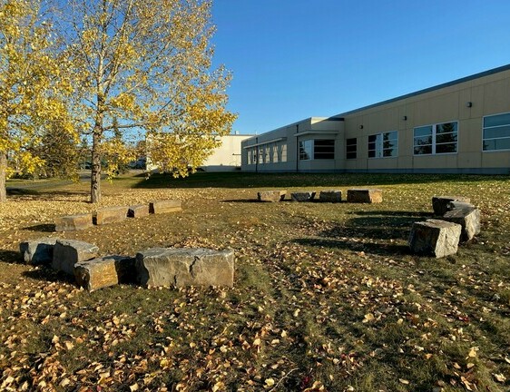Large circle of rock outside EIPS Central Services building